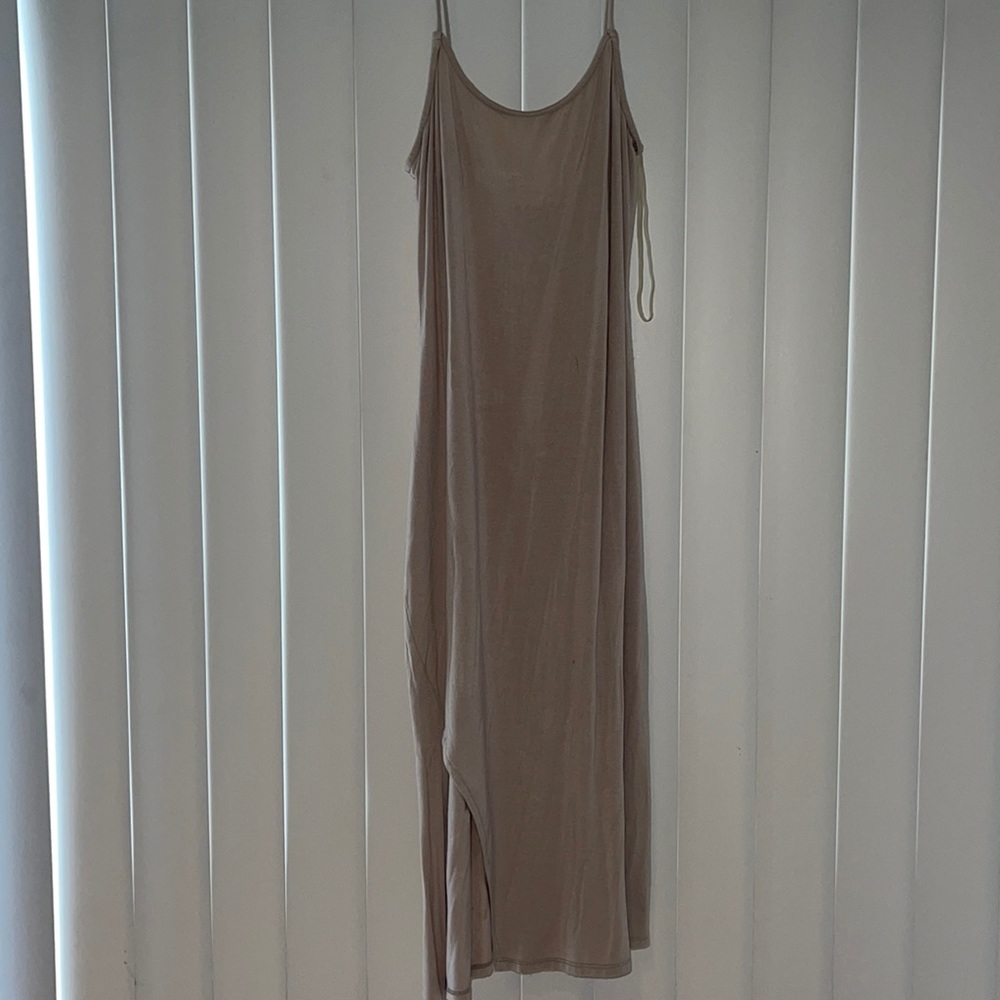 Mid length fitting slit dress